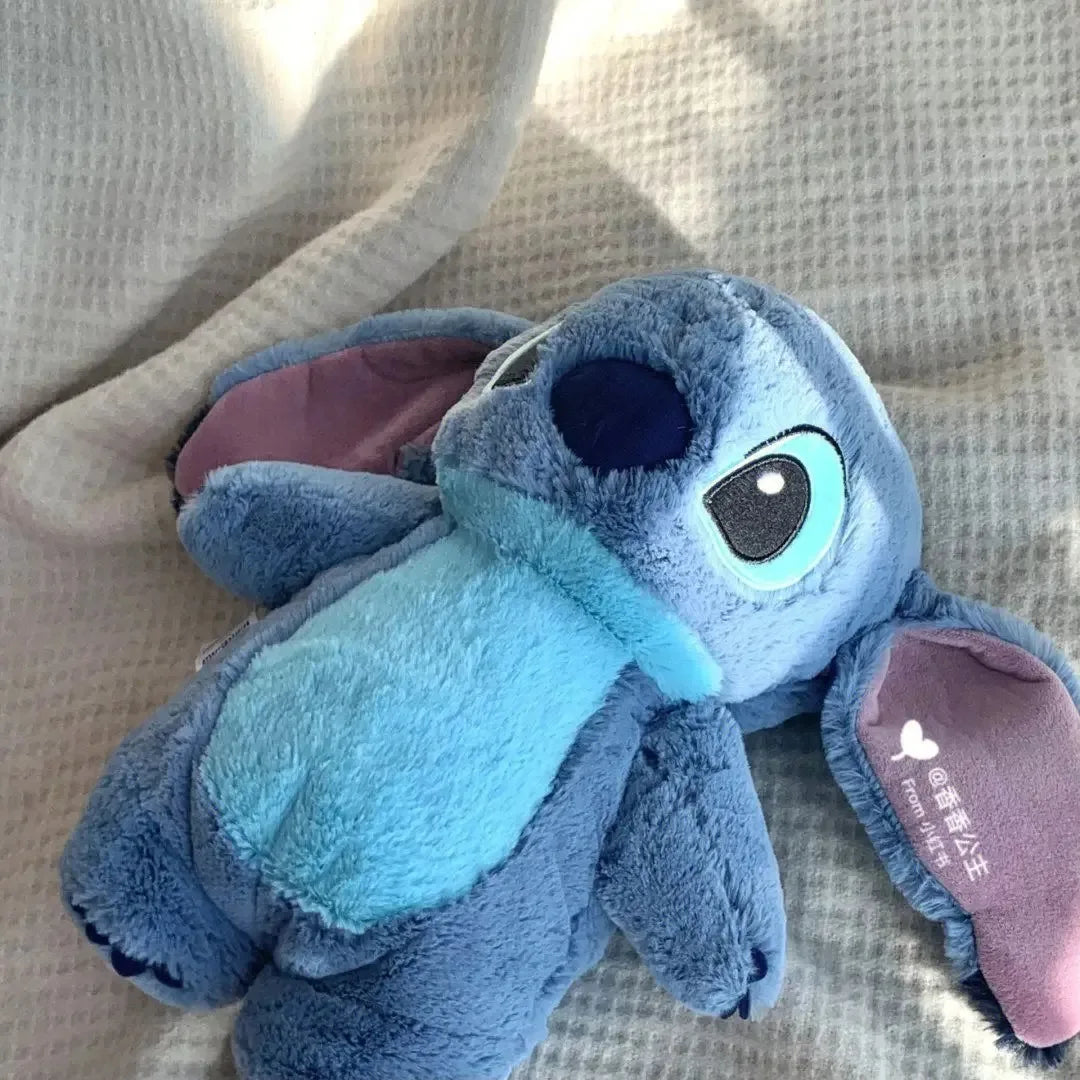 T19 - Stitch Angel Lotso Plush Hand Warm Bottle