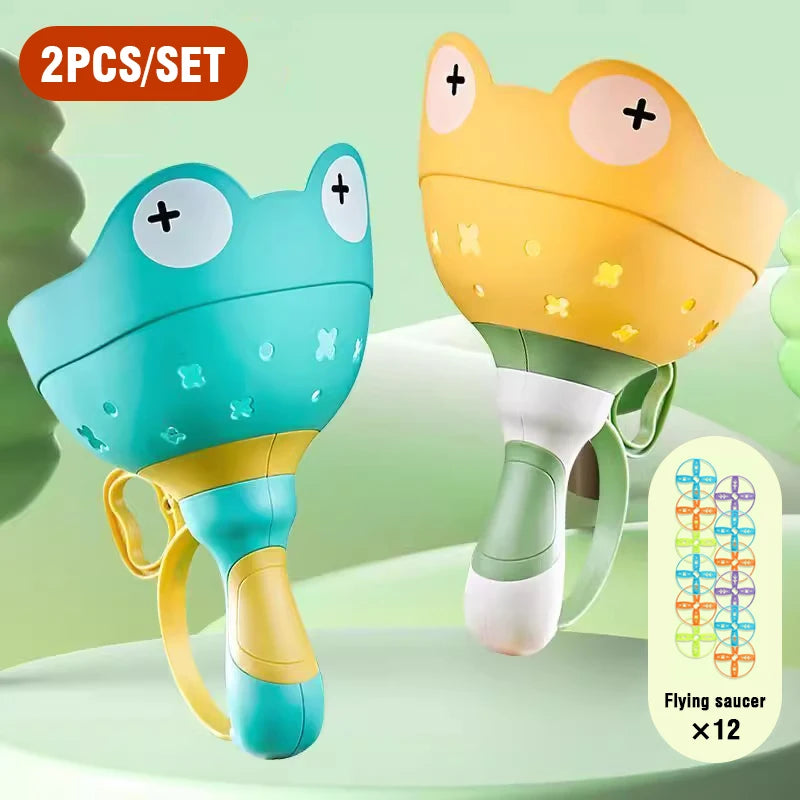 T15 - Kids Flying Saucer Disc Launcher Frog Catapult Flying Toys Pull String UFO