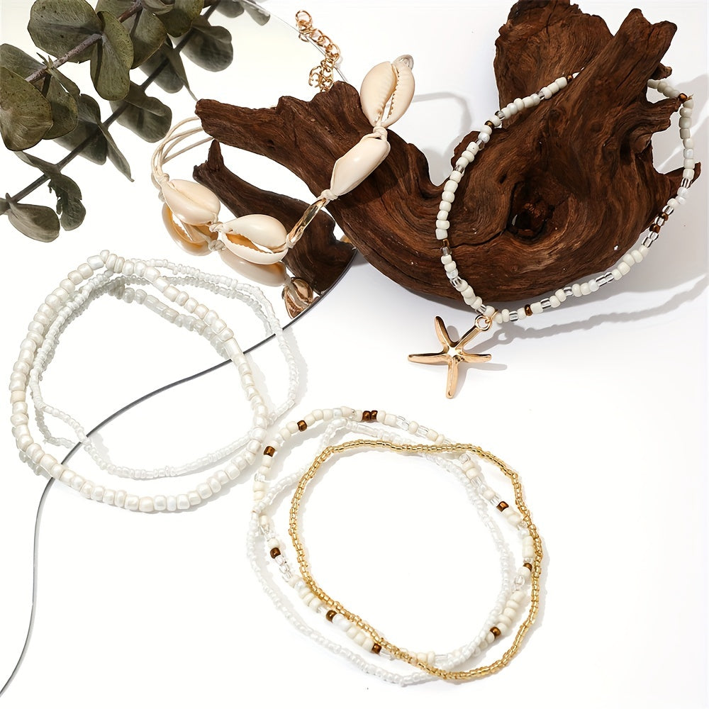 BRAC16 - Set di 6 cavigliere con ciondolo