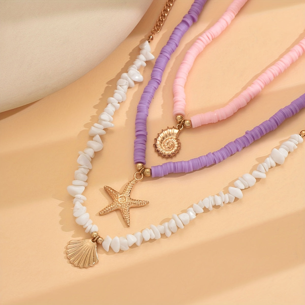 BRAC08 - 3 collane circolari in argilla con ciondolo tema marino