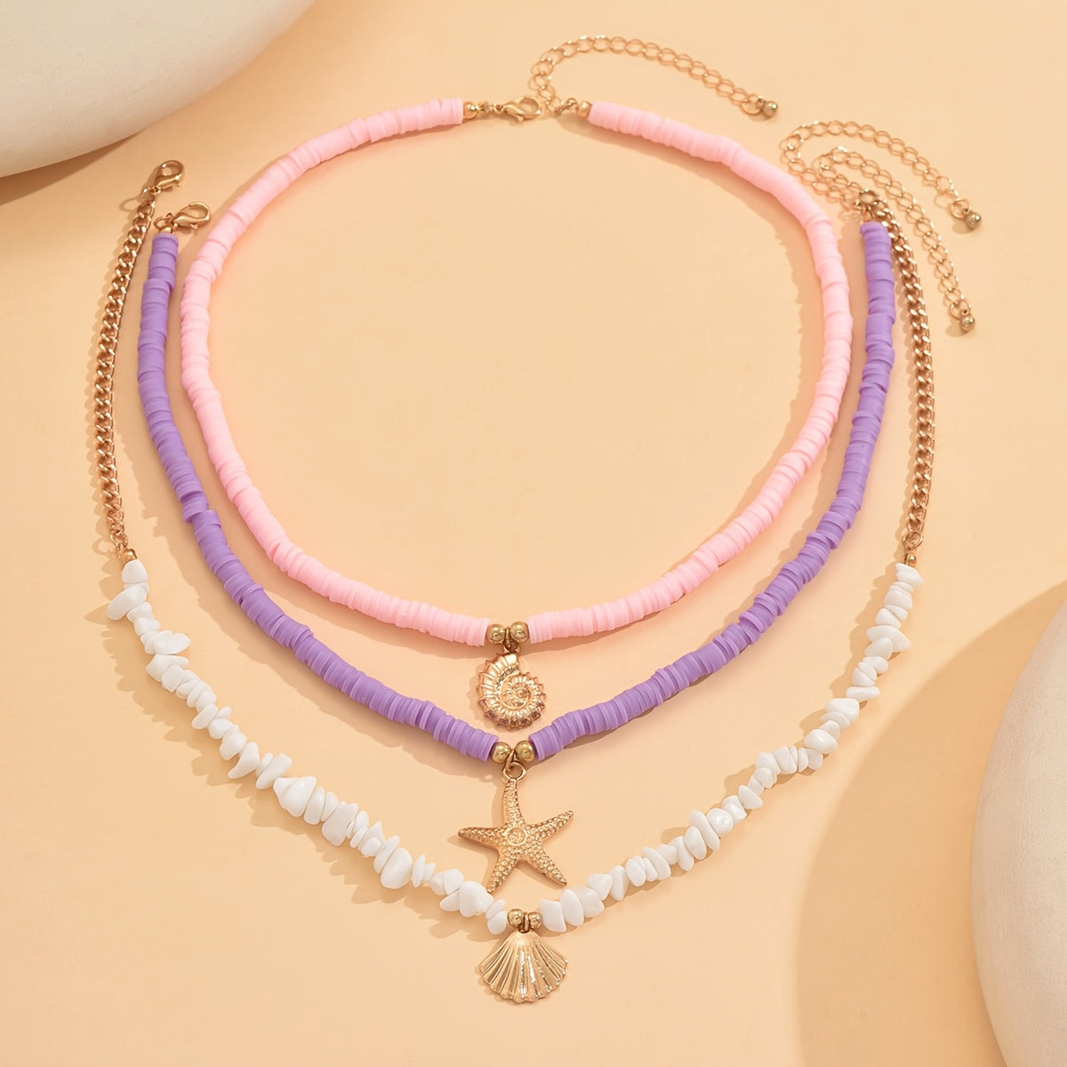 BRAC08 - 3 collane circolari in argilla con ciondolo tema marino