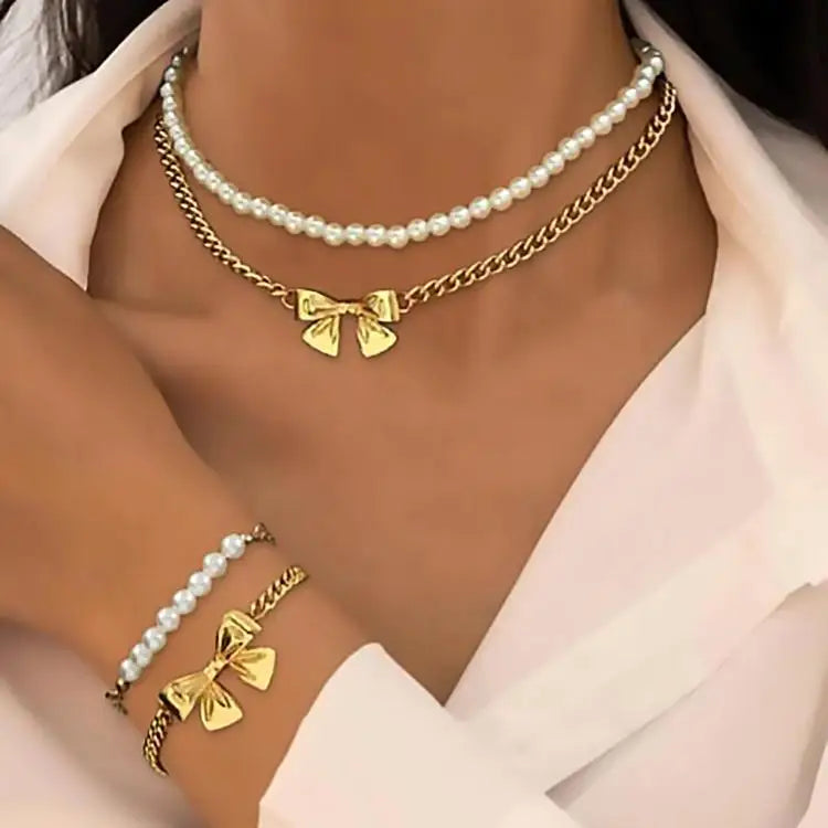 BRAC23 - Set di gioielli da donna con fiocco e perle