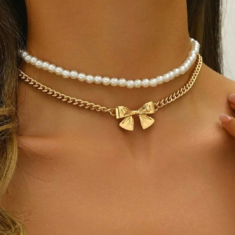 BRAC23 - Set di gioielli da donna con fiocco e perle