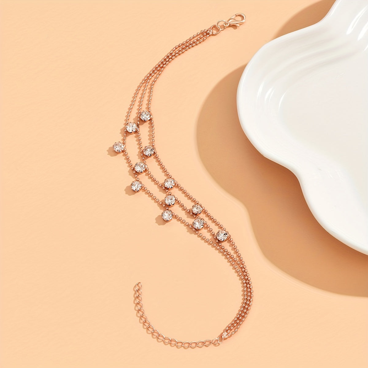 BRAC12 - Elegante cavigliera con triplo strato di strass